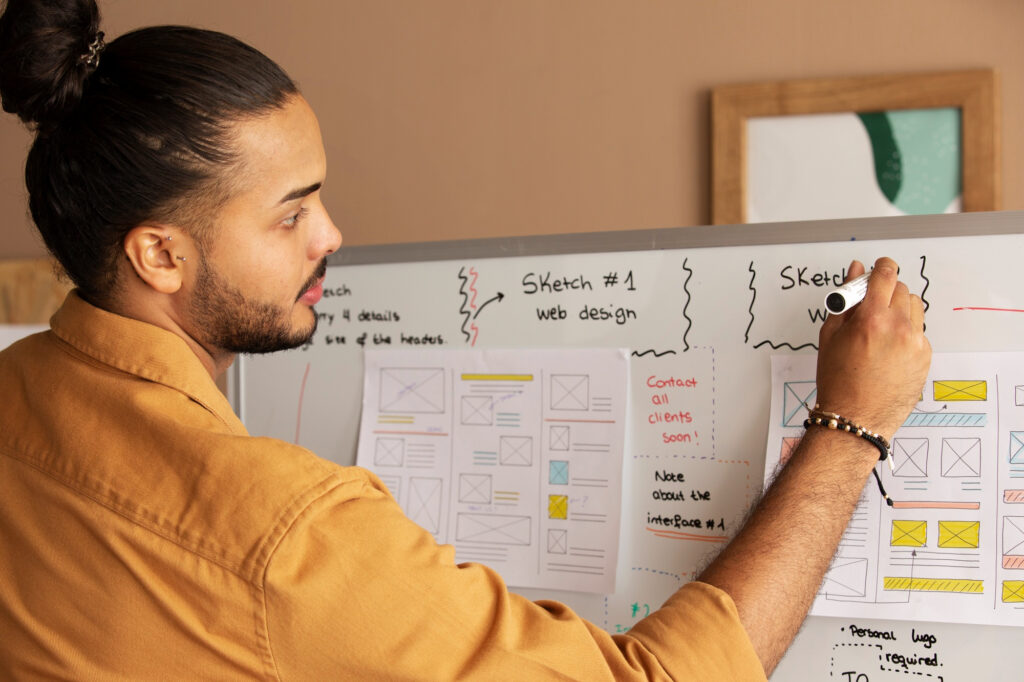 Custom software developers at Basecode planning mobile app architecture | Basecode